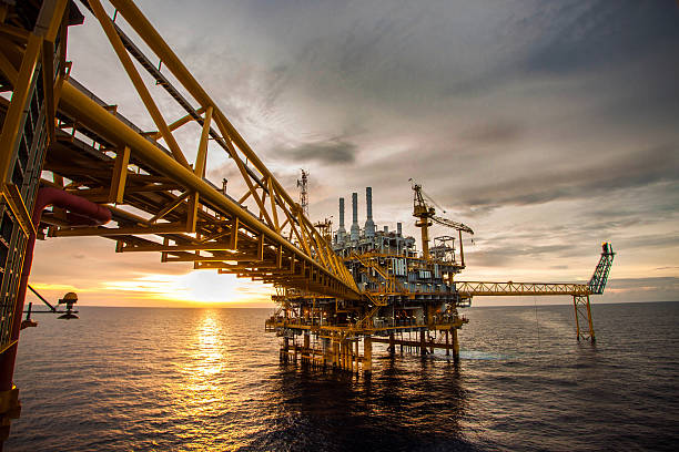 istock Oil and gas platform during sunrise or sunset 179565748