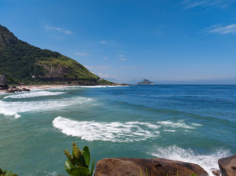 Beach in sunny summer day