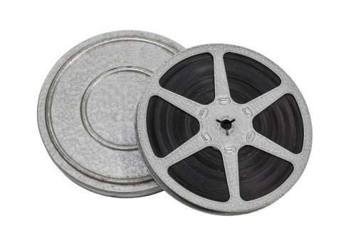 Vintage film reel and can isolated with clipping path.