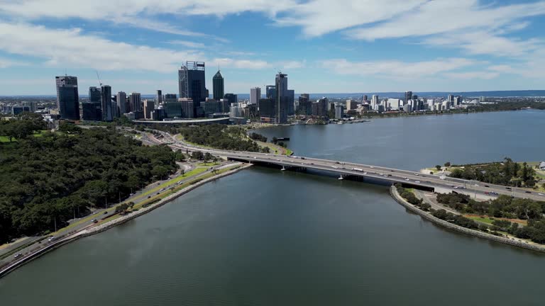 Panoramic aerial view of Narrows Bridge freeway on Swan River with the view of South Perth skyline buildings in the background, Perth, Western Australia