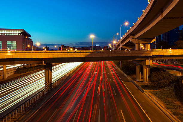 istock Urban highway traffic at night 179572879