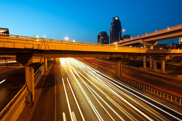 istock Urban highway traffic at night 179573448