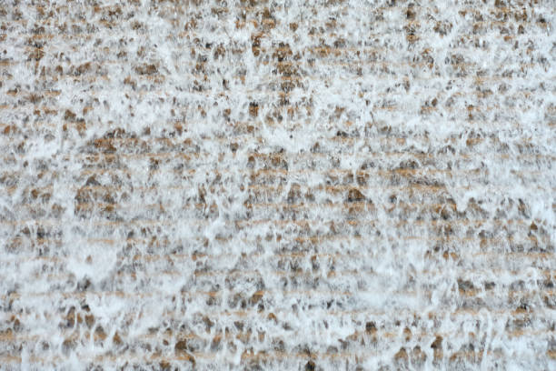 istock [Texture] Flow of water flowing down a brick wall 1795762186