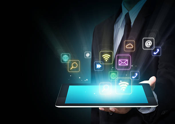 istock Tablet with cloud of colorful application icons 179576720