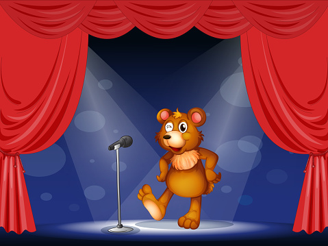 stage with a bear performing