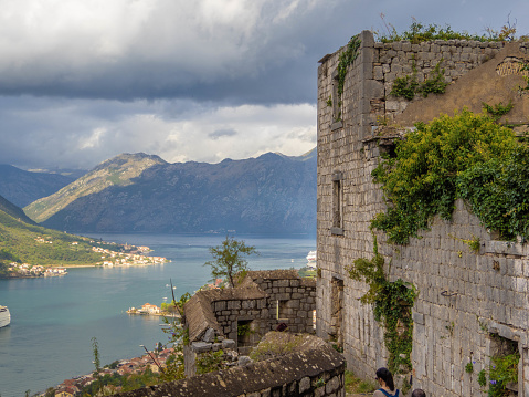 Kotor is a fortified town on Montenegroâs Adriatic coast, in a bay near the limestone cliffs of Mt. LovÄen