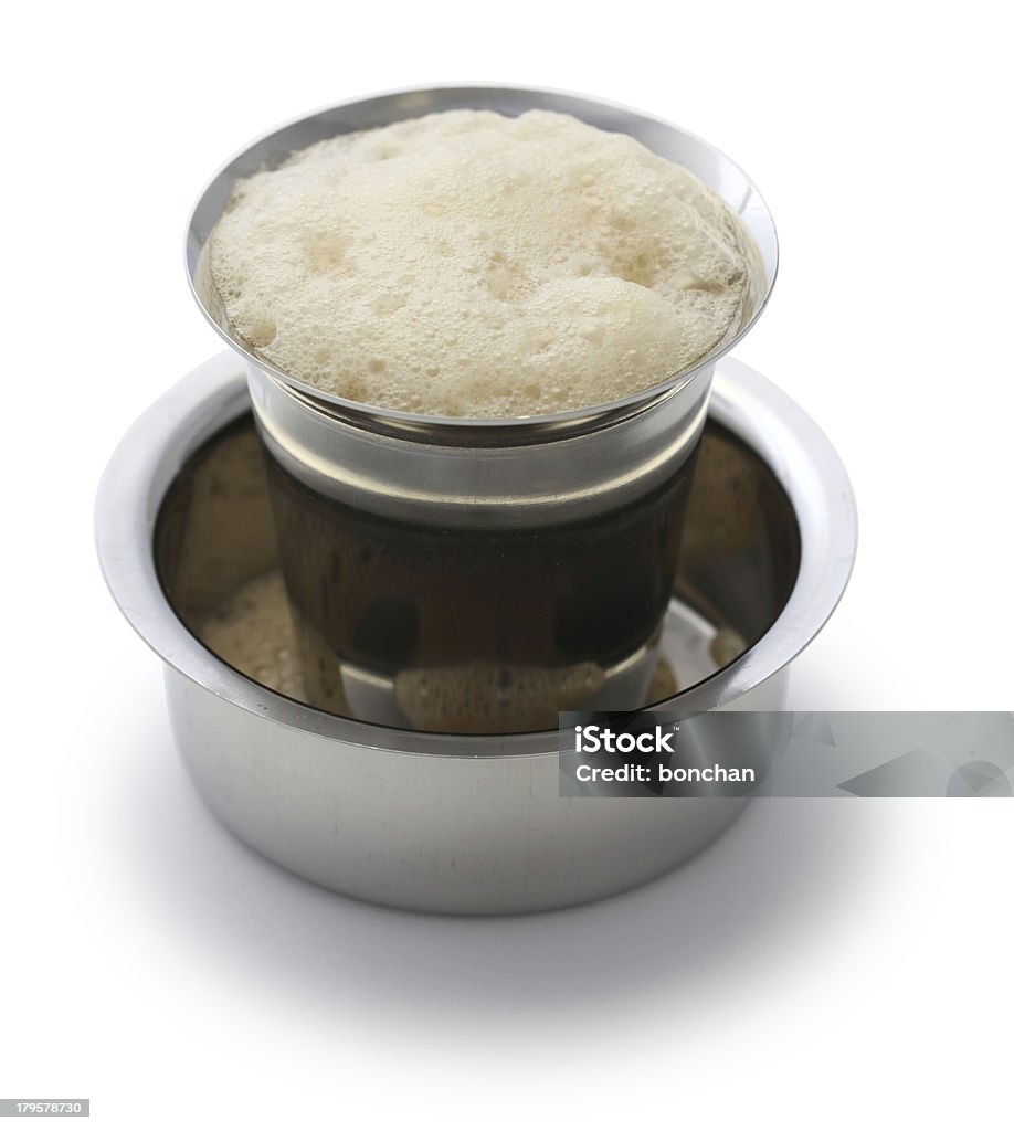 south indian filter coffee in dabarah and tumbler Madras filter coffee in dabarah and tumbler, south indian style India Stock Photo