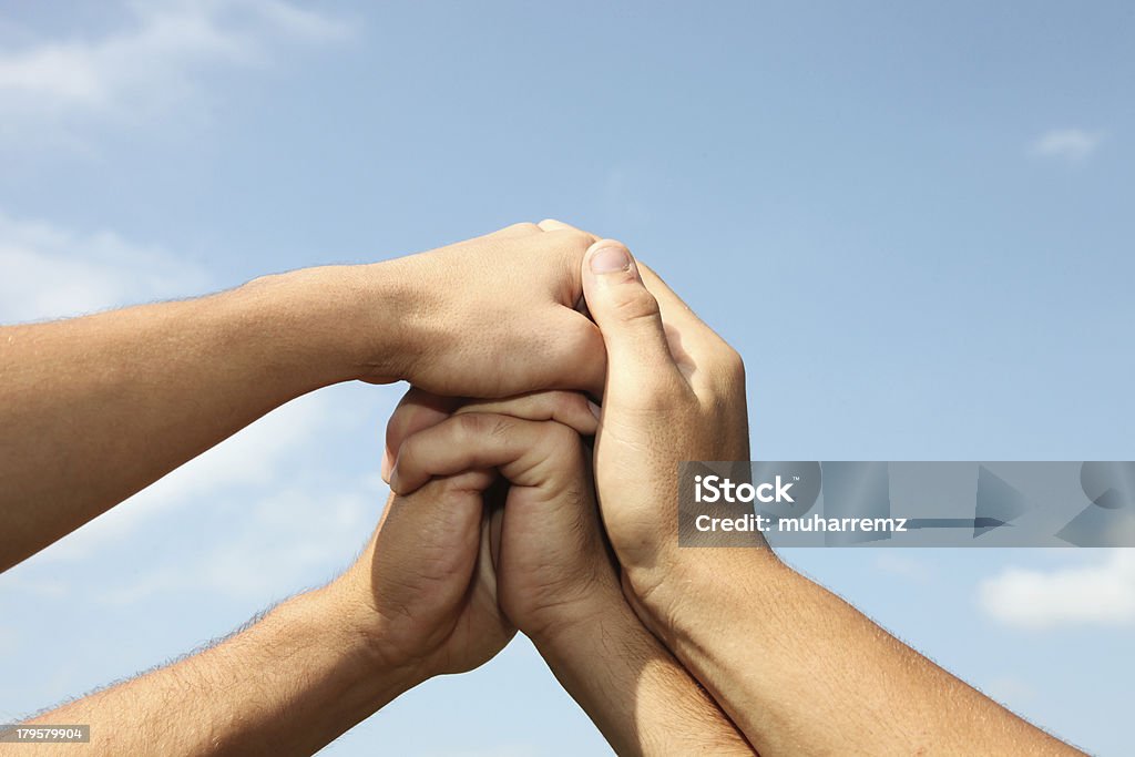 Hands in Stack of hands 20-29 Years Stock Photo