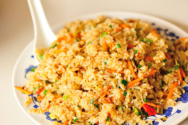 fried rice with egg and vegetables fried rice with egg and vegetables fried rice stock pictures, royalty-free photos & images