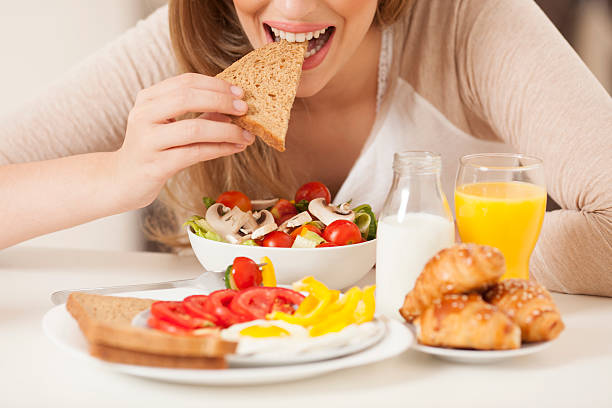 istock Woman eating healthy breakfast. 179582176