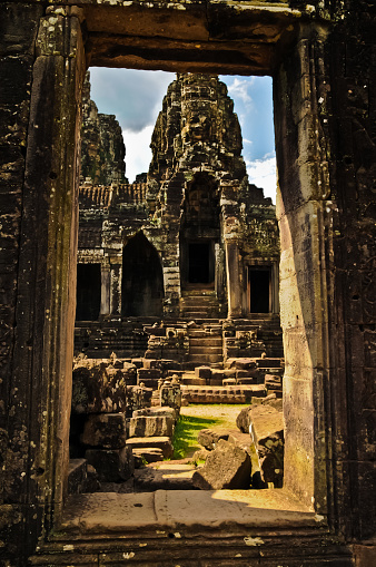 Exploring the remains of the Khmer empire on the grounds of the Angkor Wat with its many wonders and the ultimate expression of Khmer genius. Nothing compares to this, one of the world's architectural wonders. Photographed in May 2014.