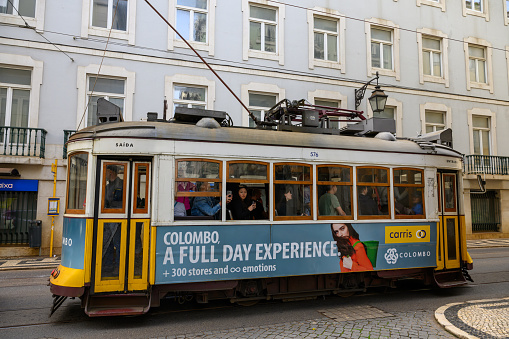 Lisbon, Portugal - February 3, 2019: Historic Elevador da Bica, electric elevator in the narrow alleys of Bairro Alto, Lisbon, Portugal, covered by graffiti on february 3, 2019