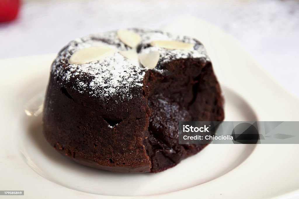 Chocolate fondant Delicious chocolate fondant with syrop close-up Baked Stock Photo