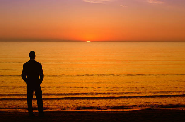 istock Businessman enjoying the sunrise before going to work 179588874
