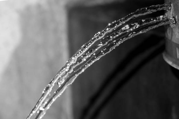 istock Water pouring from a leaking bucket, water gushing from a broken bucket 1795915814