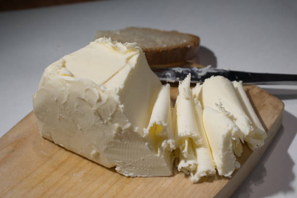 istock Cutting butter spread in sunlight shot close up 1795930407