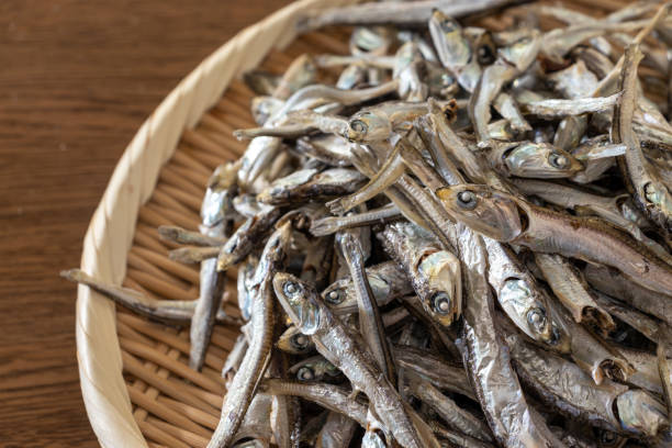 istock A pile of dried sardines on a bamboo colander 1795941534
