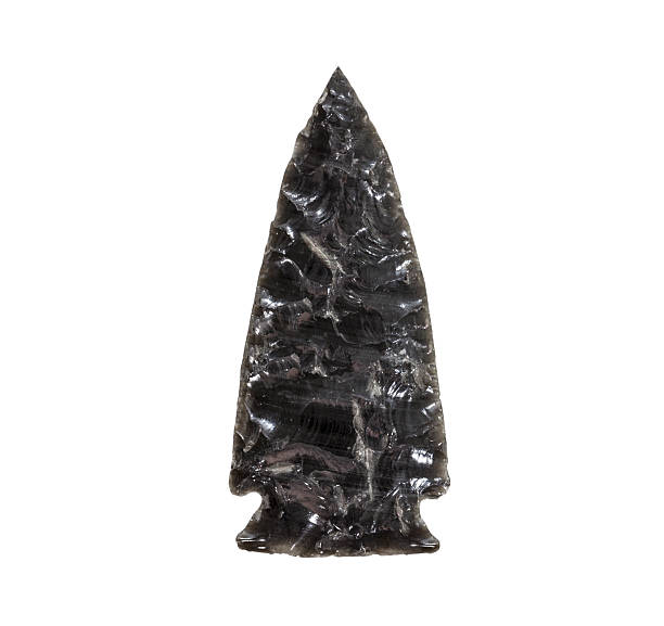 VIntage stone obsidian arrowhead isolated with clipping path.