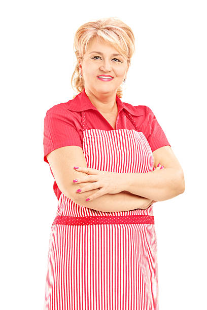 istock Smiling mature female worker wearing an apron 179596873