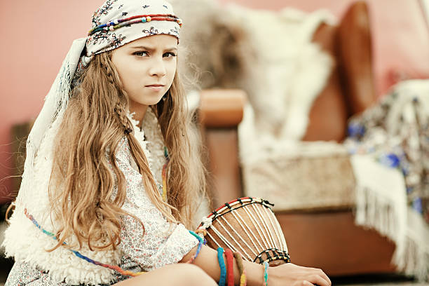 istock gipsy girl posing with drum 179598427