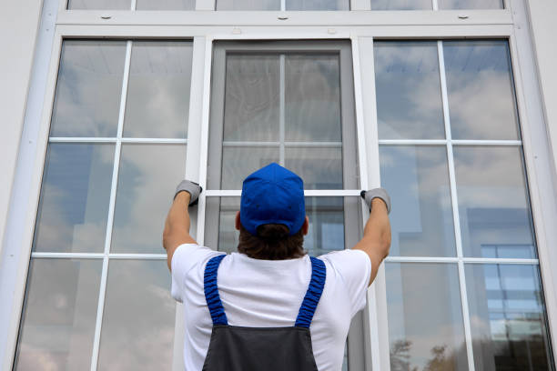istock Installation of a protective net on a white plastic window in summer 1796007806