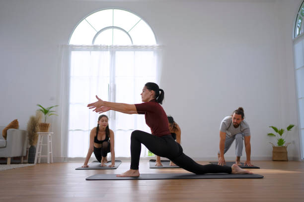 istock Group of people play yoga. 1796030208