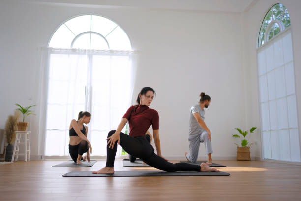 istock Group of people play yoga. 1796030978