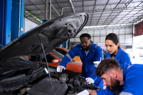 istock Mechanic work at auto repair shop. 1796058794