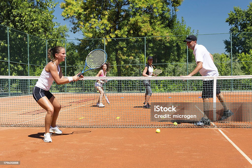 Cardio-tennis - Photo de Quatre personnes libre de droits