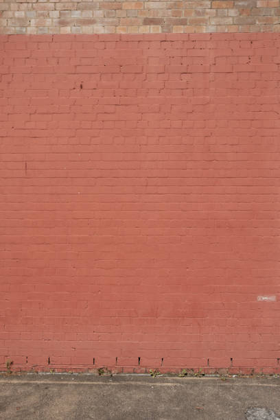 istock Part of an old peach colored brick wall 1796064633