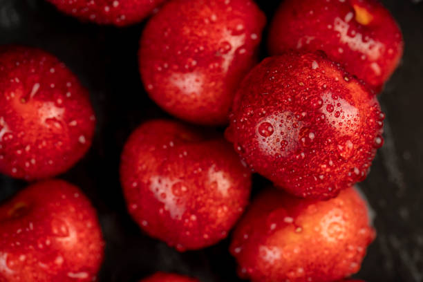 istock delicious collected and wet cherry berries with pits 1796073601