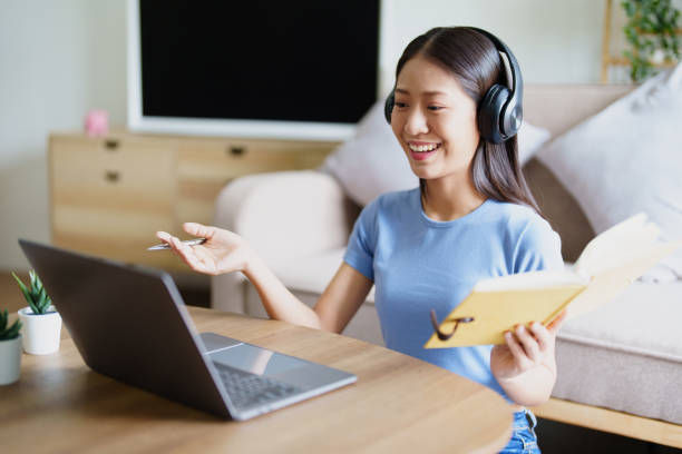 istock Studying online, beautiful Asian female student or student studying online at home 1796077195