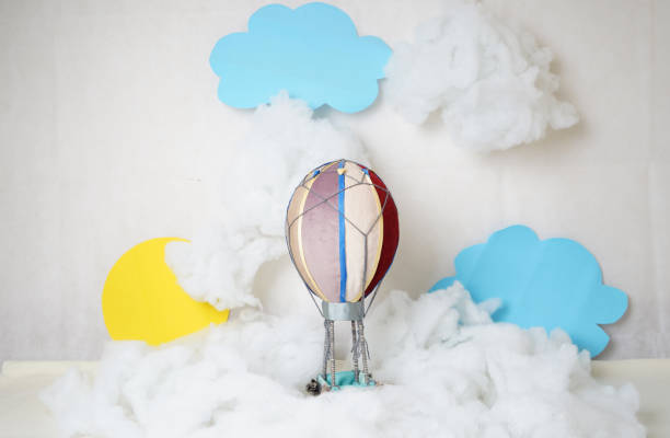 istock the decoration is a small multicolored balloon in white clouds and blue sky 1796078328