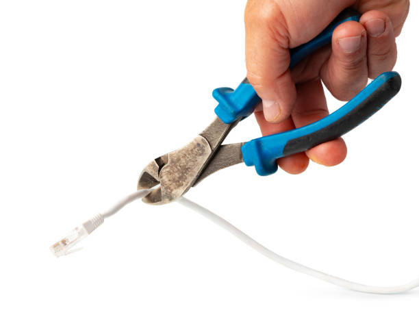 istock Cutting pliers cut electric cable close up 1796079944