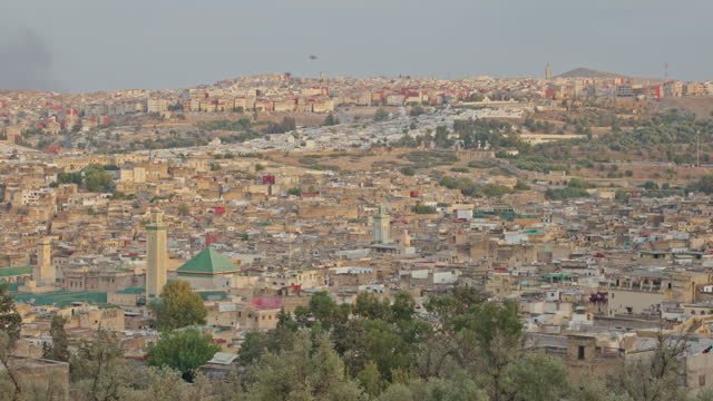 Panoramic view of the city of Fes, Morocco, shot from a hill over the old medina.
