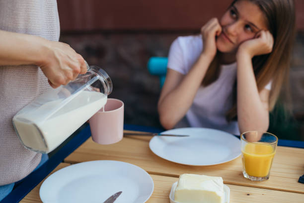 istock mother and daughter at home 1796139712