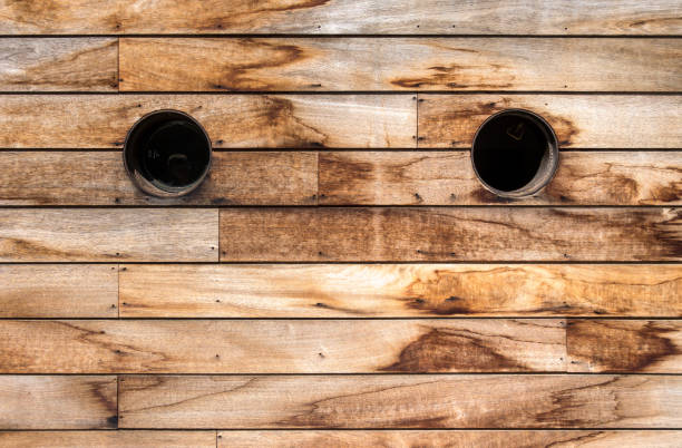 istock Brown wooden wall texture with portholes 1796181318
