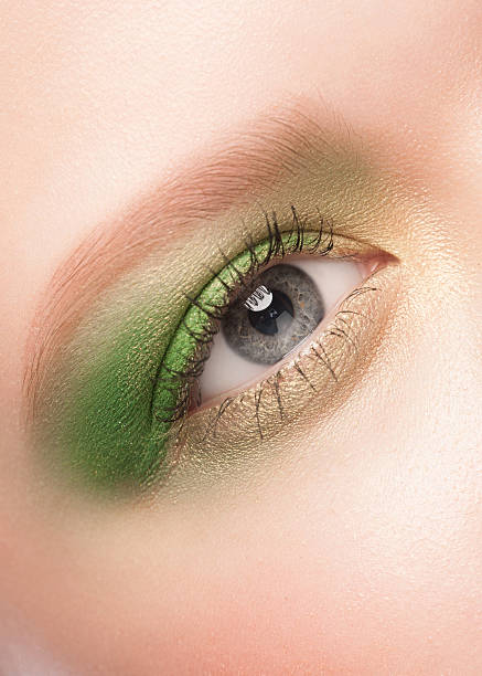 istock Woman eye with green makeup 179620351
