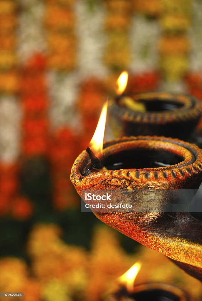 Diya Closeup of a diya - concept of prayer and celebrations..Depth of field. Focus on thread. Beautiful People Stock Photo