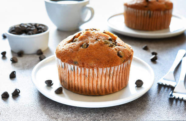 istock Muffin with chocolate chips and a cup of coffee. Morning and breakfast time. 1796227262