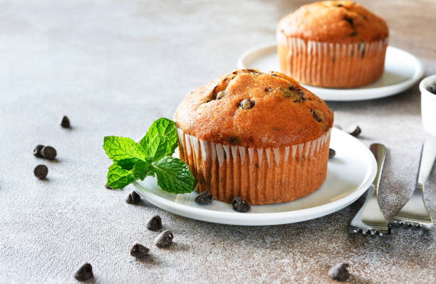 istock Muffin with chocolate chips and a cup of coffee. Morning and breakfast time. 1796227269