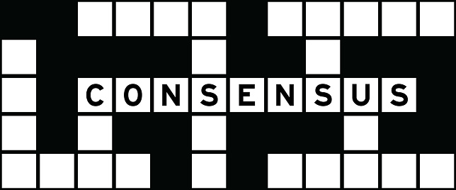Alphabet letter in word consensus on crossword puzzle background