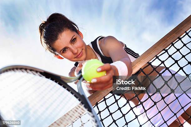 Young Girl Playing Tennis At The Beautiful Weather Stock Photo - Download Image Now - Tennis, Teenage Girls, Teenager