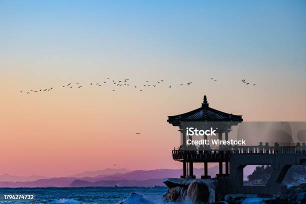 Idyllic Sunset Scene Featuring A Traditional Oriental Pagoda Gangwondo Sokcho Yeonggeumjeong Stock Photo - Download Image Now