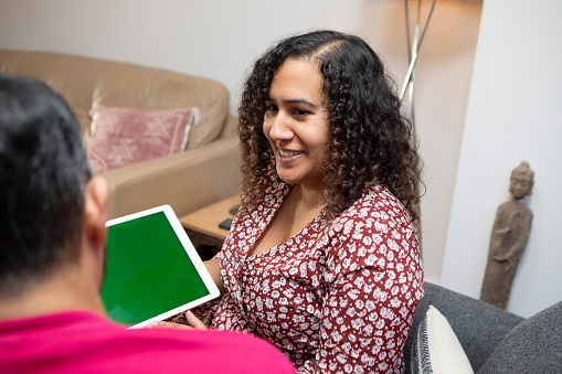 Part of a series: Family at home having warm and optimistic interactions in everyday situations