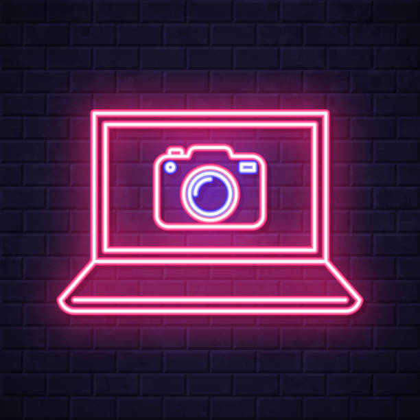 ilustrações de stock, clip art, desenhos animados e ícones de laptop with camera. glowing neon icon on brick wall background - conference call flash