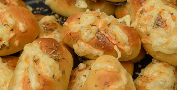 istock Delicious homemade rolls baked with yellow cheese 1796297312