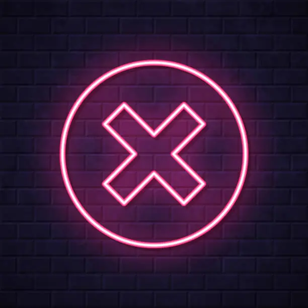 Vector illustration of Cross mark. Glowing neon icon on brick wall background