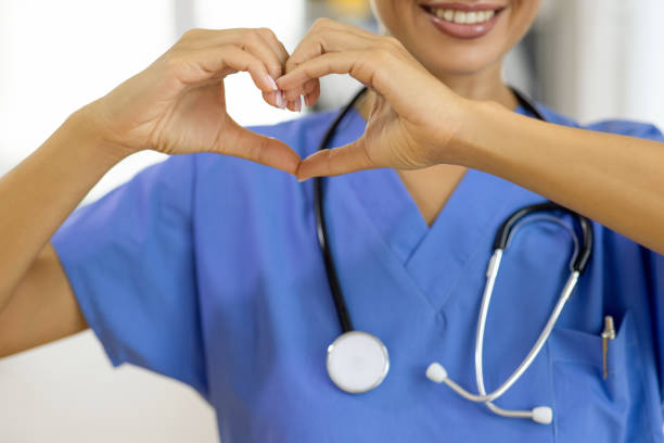 istock Smile and make her hand to heart shape 1796325644