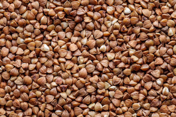 istock Buckwheat groats in bulk, grains close-up, background 1796336889